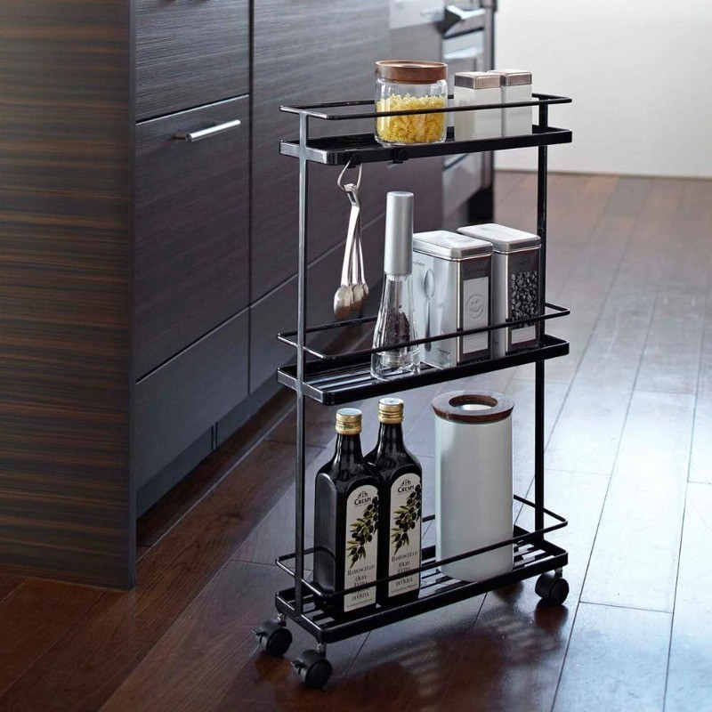 Black version of the rolling kitchen cart with two shelves and jars